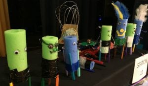 Scribblebots made of pool noodles with human like features on its face