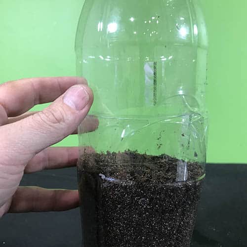 Top half of the PET bottle being reconnected