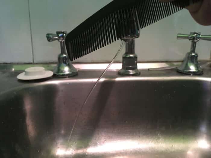Become a Water Bender Science Experiment - charged nylon comb near tap water