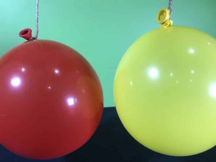 Blow em apart science experiment - balloons hanging down and ready to go