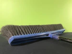 Broom balance science experiment - a regular broom