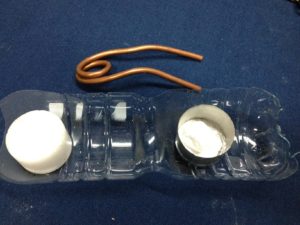How to make a pop pop boat science experiment - using the candle as ballast for the boat bow