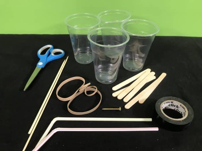 Create a rubber band racer science experiment - materials needed