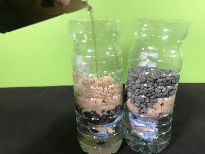 Create a water filter science experiment - pouring dirty water into a filter