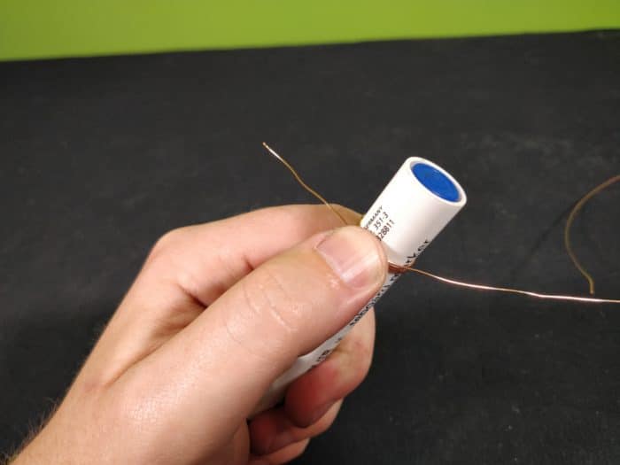 Make a Simple Motor - leave 5cm of wire free, begin to wrap the copper wire