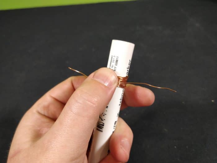 Make a Simple Motor - wrap the wire tightly leaving roughly 5cm free on both ends