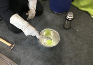 Liquid nitrogen and tennis ball science experiment - stirring a tennis ball in liquid nitrogen
