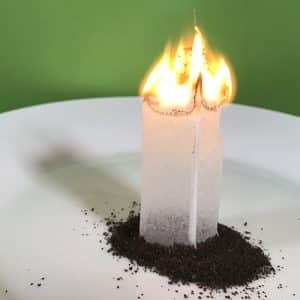 An open tea bag with fire on top