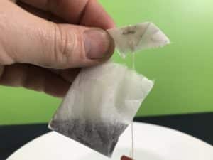Tea bag rocket science experiment - ripping the stapled teabag