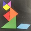 multiple coloured wooden shapes making a model of a fox