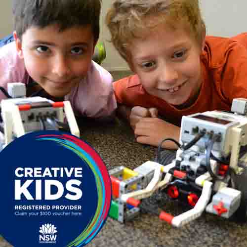 Two kids with Lego robots on the floor plus the NSW Creative Kids logo