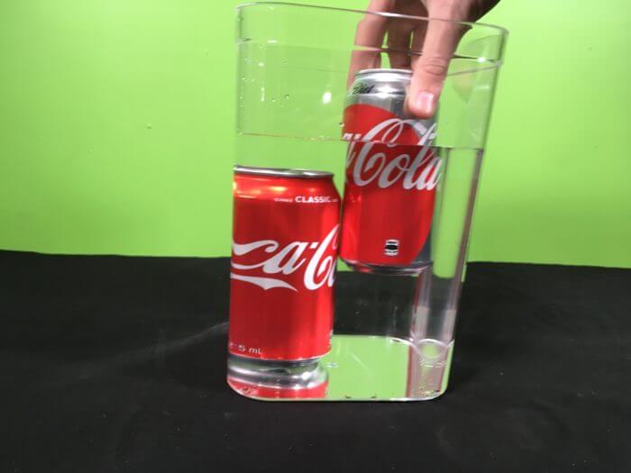 Sweet Drinks Science Experiment - placing diet coke into water
