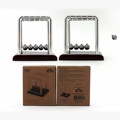 Two Newtons cradle with their cardboard boxes below them