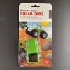 Green toy car with solar panel in packet