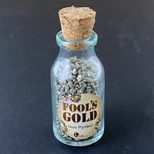 Fools gold in a vintage glass bottle (plus cork)