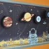 A close up of the Create your own solar system wallchart, showing Jupiter, Saturn, Uranus and Neptune
