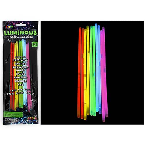A bundle of glowing glowsticks next to their packaging on a black background