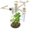 Weather station by Green Science. The picture shows a plastic bottle with a variety of measuring tools mounted to it on a plastic frame