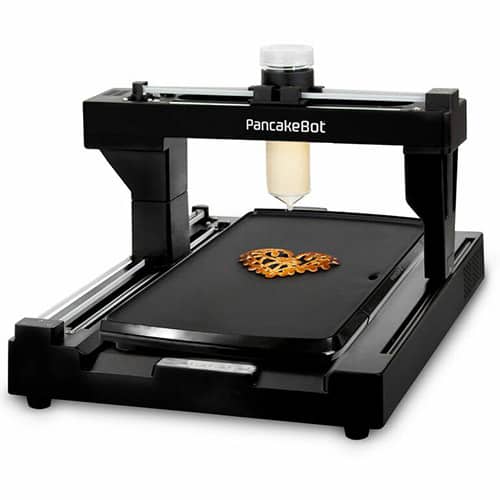 A flat 3D printer with a pancake on it