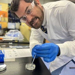 Matt Dodds working with genetically modified E.coli